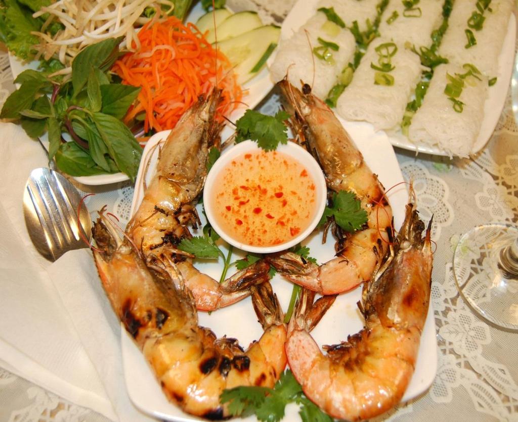 Specialty Fine-Rice-Vermicelli & Jumbo Shrimp - Ba nh Ho i Tôm Nươ ng, contains the fine-rice-vermicelli rolls, topped with slightly oiled green onions, served with 4 Grilled Jumbo