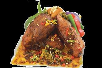 Suree s Signature Cha Cha Cha 19 Grilled pork shanks served with a fiery and spicy sauce made of peppercorn, fingerroot, and