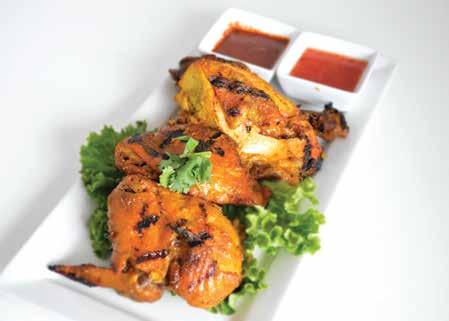 ) marinated with Thai spices, grilled, and served on a sizzling plate with vegetables, dark plum sauce, and a spicy dipping
