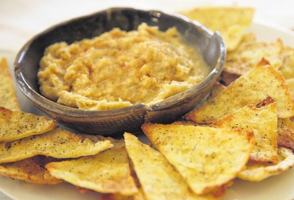Hummus Hummus is a popular dip. You can serve it with warm pita bread, pita chips, or cut veggies. 1 Rinse and drain the chickpeas.
