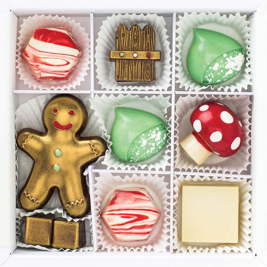 hansel + gretel (1) dark chocolate gingerbread man (1) white chocolate mushroom (1) dark chocolate picket fence (1) white chocolate nibble square (2) white chocolate peppermints illed with chocolate