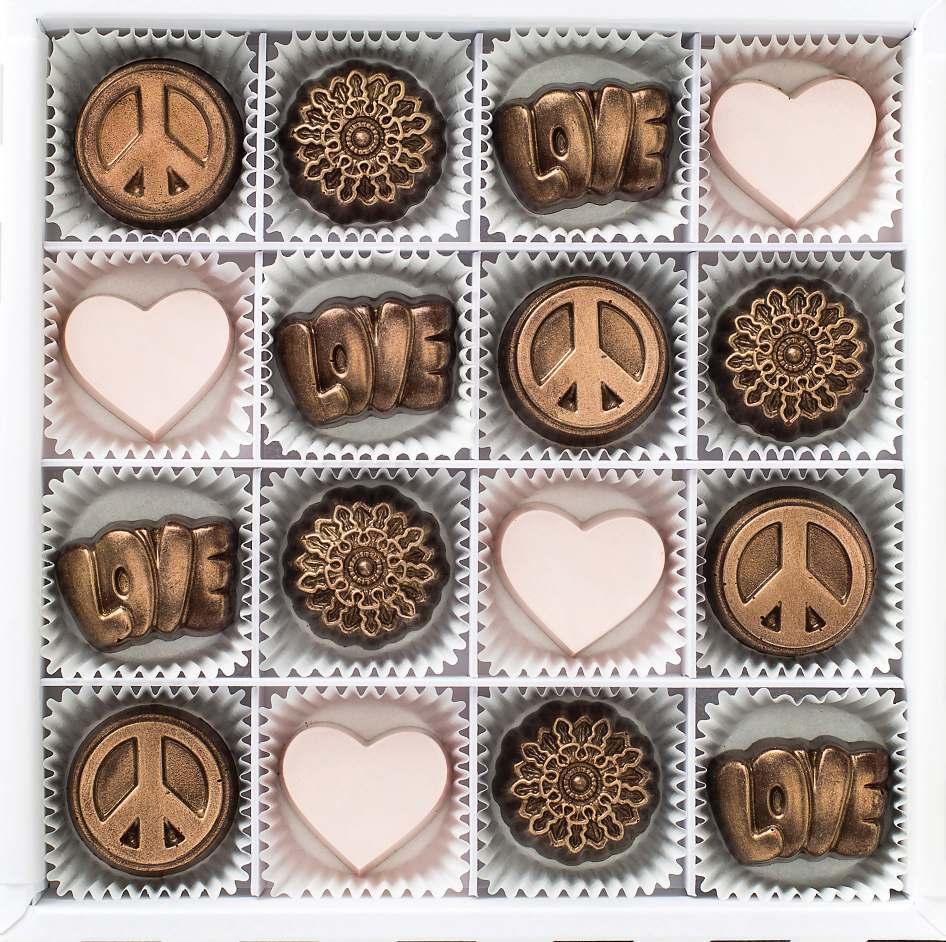 peace, love & happiness (4) milk chocolate peace signs illed with cream caramel + chocolate nougat (4) white chocolate hearts illed with vanilla