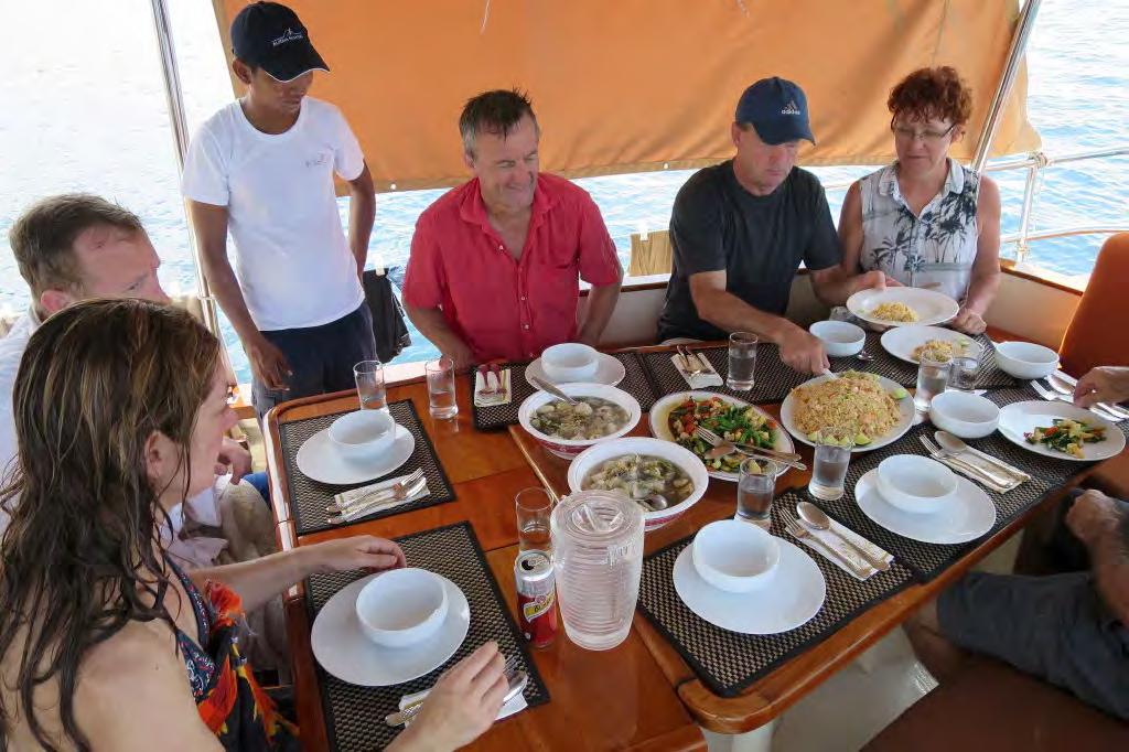 and soups, which made for the perfect ending to our days exploring the beaches, sea caves and lagoons of Phang Nga Bay. Guests enjoy one of the many delicious Thai meals on Burma Boating's cruise.