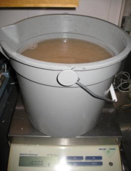 Figure 10: On the left, the disintegrated pulp has been diluted to 10 kg. Remember to measure sample amounts in weight, as volume is temperature dependent.