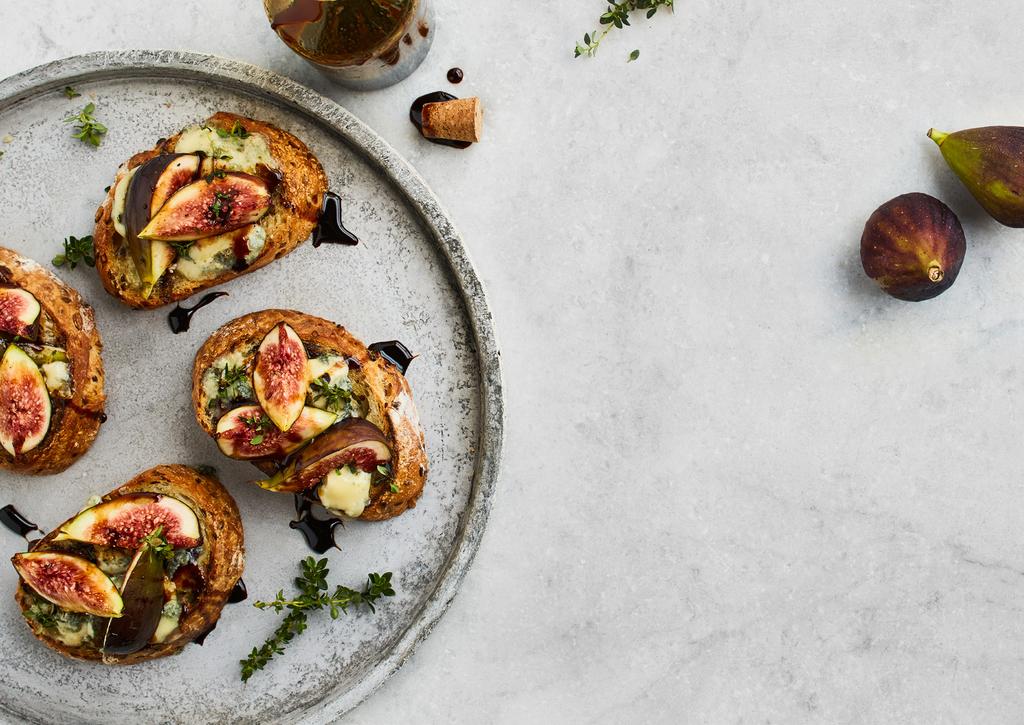 Fig and Blue Cheese Bruschetta with Pomegranate Molasses Serves 6 2 LOAVES OF BAKERS DELIGHT AUTHENTIC MIXED SEED SOURDOUGH VIENNA 170g BLUE CHEESE, CRUMBLED 6 LARGE FIGS, TRIMMED AND QUARTERED 6