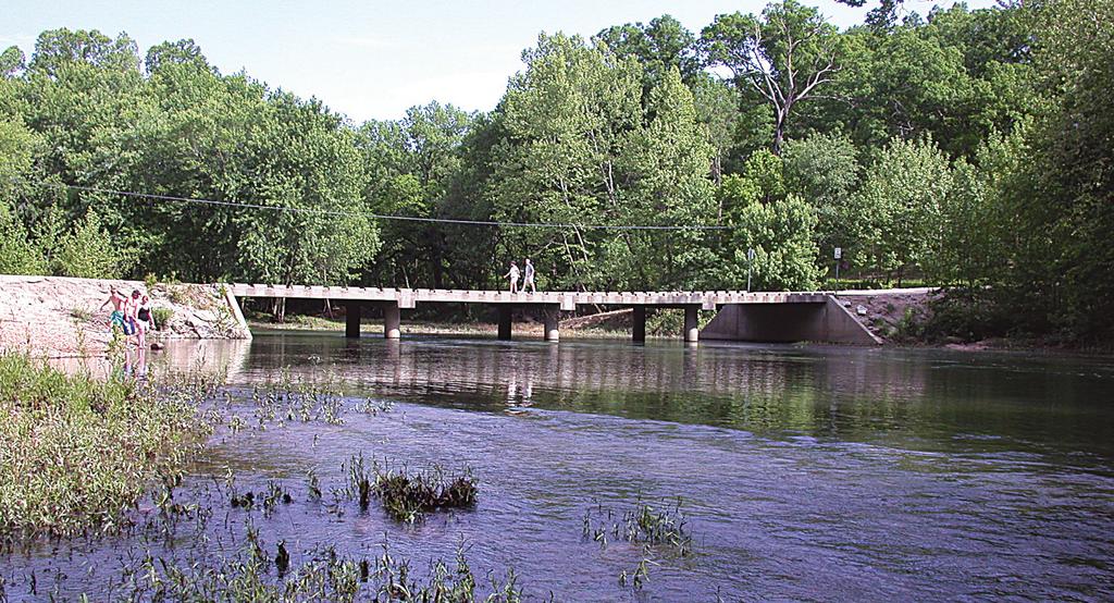 Low-water bridges generally have greater capacity and are able to pass higher ﬂows underneath the driving surface than most vented and unvented fords.