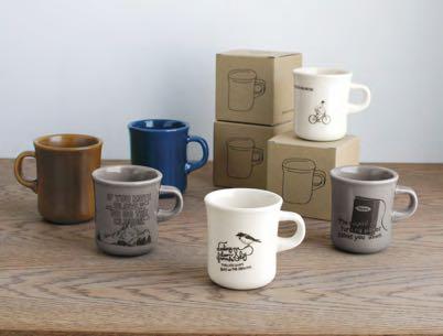 Mugs with a gray clay base and dark colored glaze give messages that will relax you.