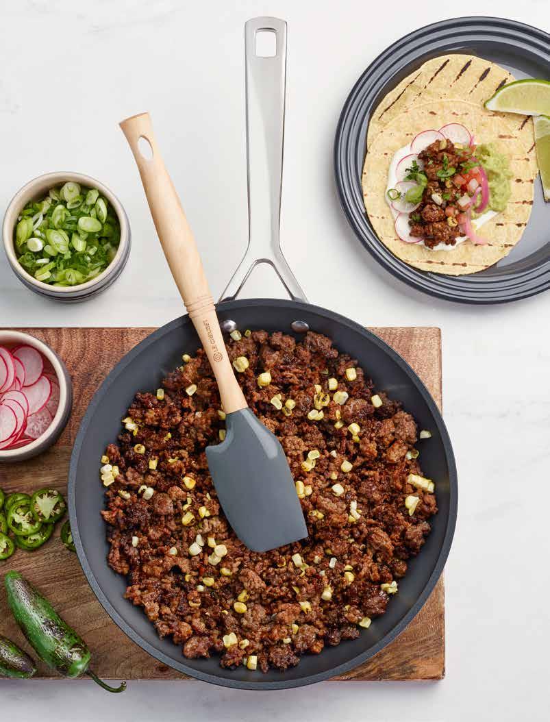 TACOS FOR LUNCH A FAMILY STAPLE With a handful of poblano chili peppers and seasoned ground beef browned in Le Creuset's celebrated Forged Nonstick Frypan, get ready to celebrate a deeply lunch