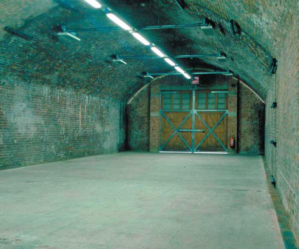 The Arch Space The Arch Space has exposed brick walls, concrete floor and a