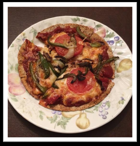 Homemade Gourmet Pizza Ingredients - Serves: 1 1 Ezekiel sprouted wheat tortilla (thawed) 4 tablespoons of tomato/pizza sauce 1 Garlic clove, minced 1/4 cup Onions, chopped 1/4 cup Green Bell