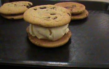 4. Place a second small cookie on top of the ice cream with the top side of the cookie facing up. 5.