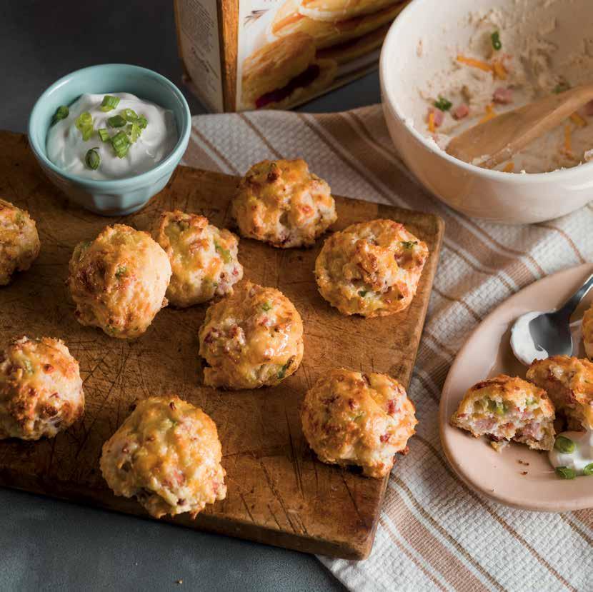 sharp cheddar cheese, shredded 3 4 cup buttermilk 2 cup sour cream 2 Tbsp. melted butter. Preheat your oven to 350 F. 2. Place the CB Old Country Store Buttermilk Baking and Biscuit Mix, ham, scallions, and cheddar cheese in a mixing bowl.