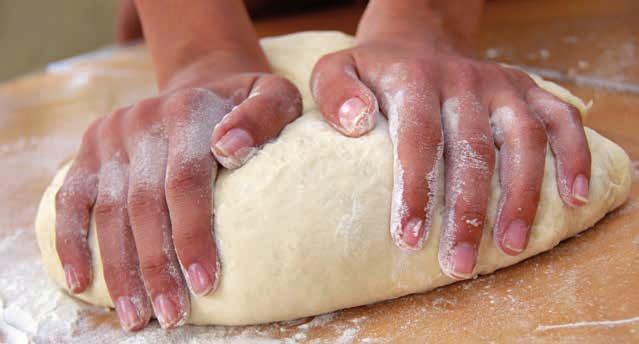 PIZZA BASE MAKES 10 small BASES or 6 large BASES 1 tablespoon dried yeast ½ teaspoon sugar 1 cup warm water ½ teaspoon salt 1¾ cup high grade white flour 1 Preheat the oven to 220 C.