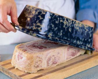 Press the terrine to give it a dense texture Weight the terrine to firm the texture. When the pâté is cool, pour off any excess juices.