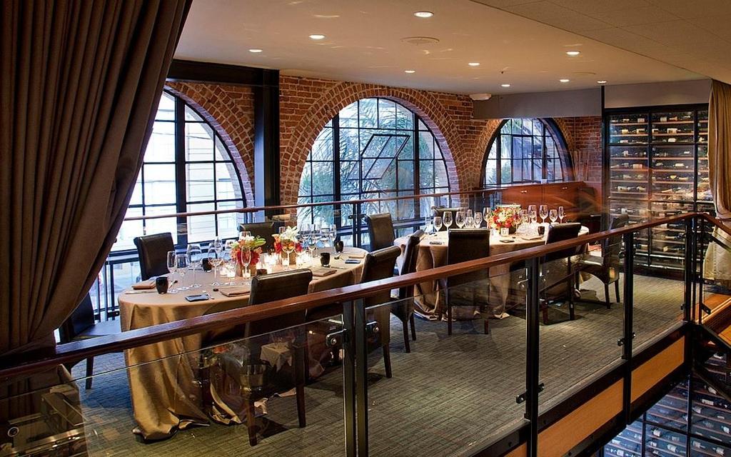 THE BOARD ROOM Located on the Mezzanine level overlooking the Main Dining Room, the private Board Room is ideal for small parties seeking an intimate gourmet