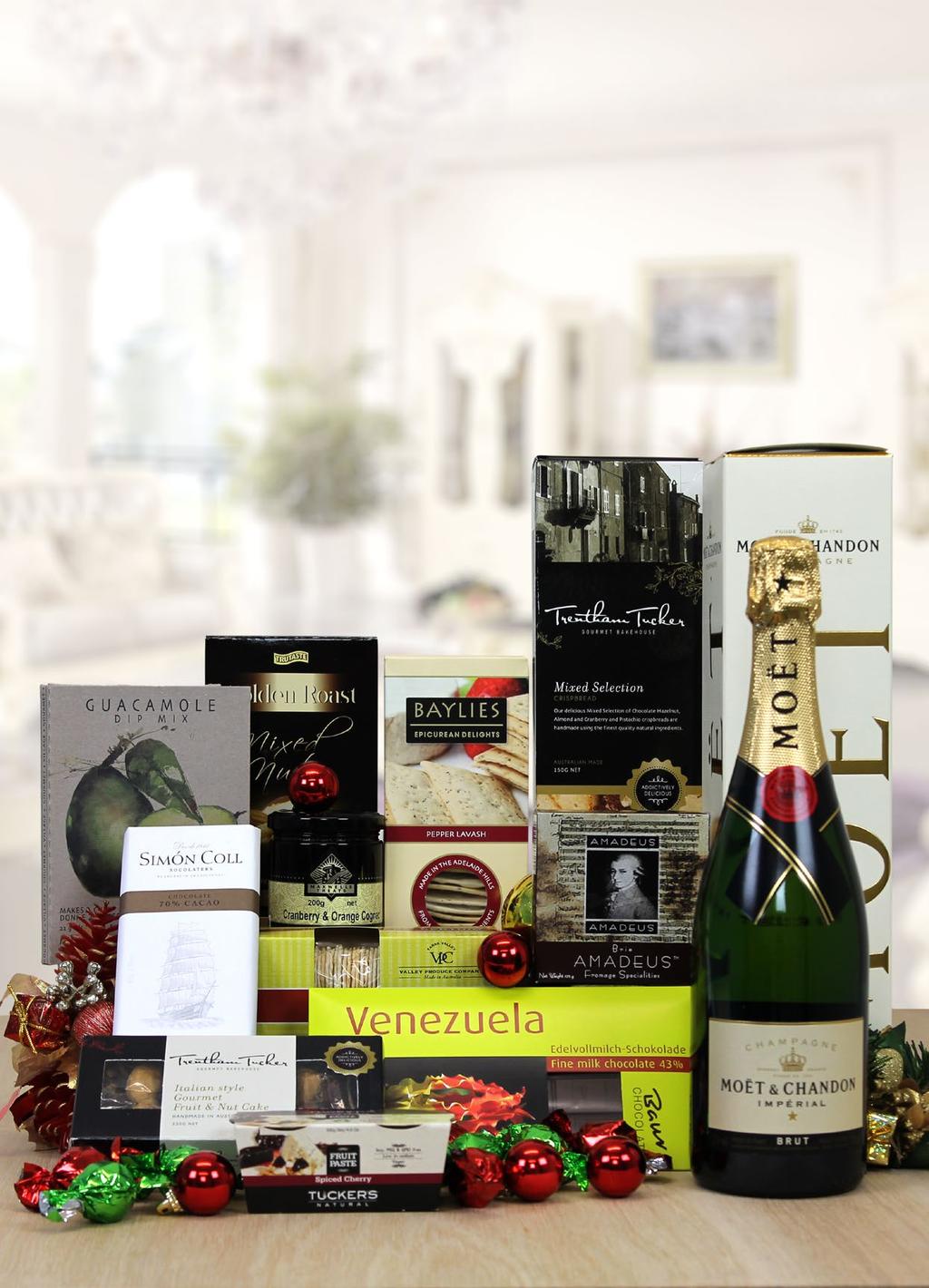 houses, this superb gift box makes a statement like no other. A bottle of iconic Champagne is the most elegant way to convey your compliments of the season.