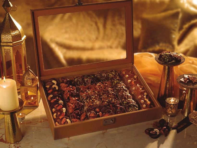 Grandeur The centrepiece of the entire festive gifting range is a collection of various treats like Milk Mendiants, Dark Mendiants, Milk Chocolate Rochers, Dark Chocolate Rochers,