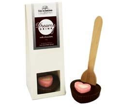 DREAMY DRINK - MILK $4.50 50g milk chocolate on a spoon with a marshmallow.