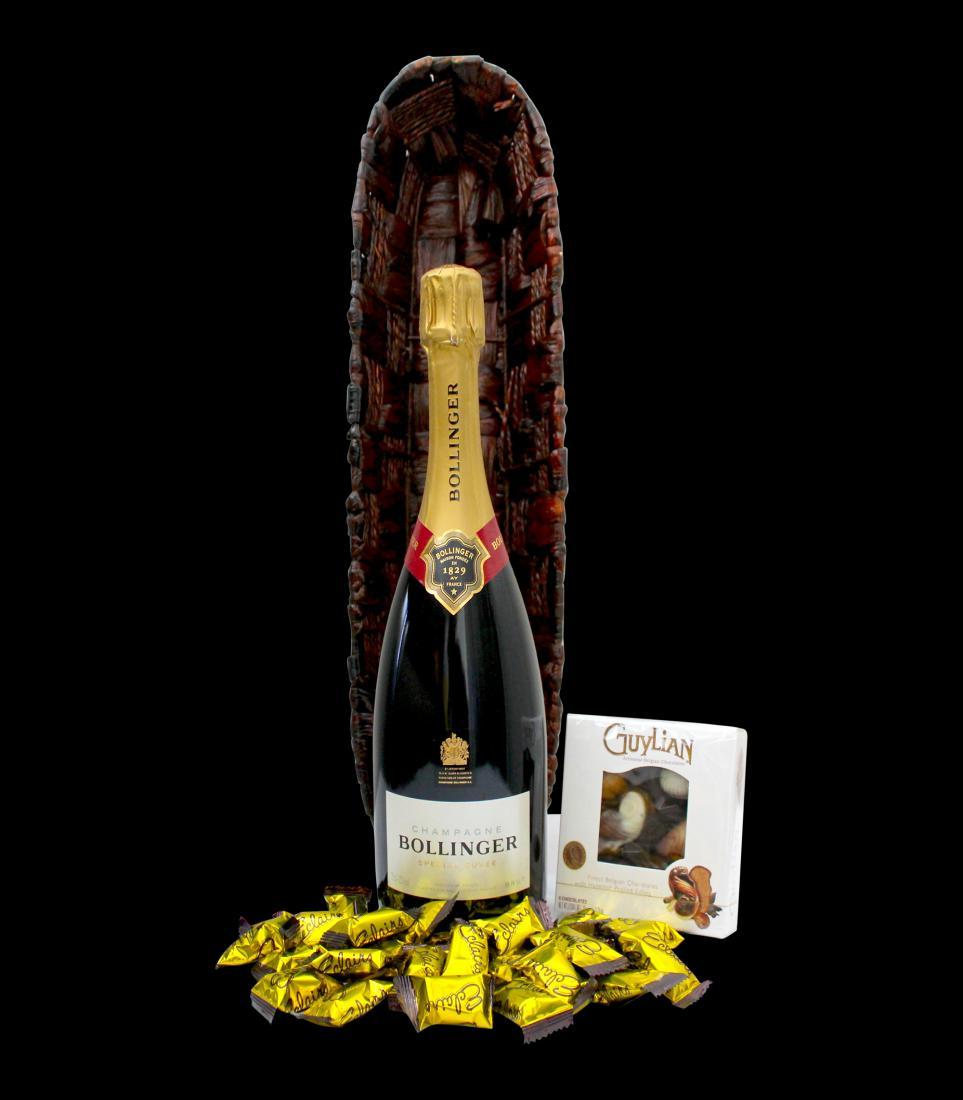 Bollinger Special Cuvee Christmas Picnic $149 $125 Bollinger Special Cuvee 750mL Guylian Fine Chocolate Shells 65gm Pascall Eclairs 110gm Presented in a Gift Basket with Christmas ribbons, bearing