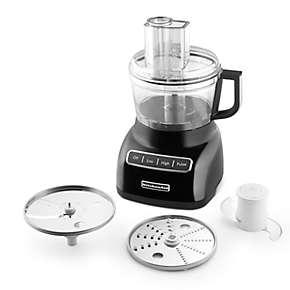 Food Processor An appliance consisting of a container in which food is cut, sliced,