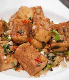 16 Pan fried tofu (Dau Hu Chien Toi Ot) Pan fried tofu with chillies and garlic.