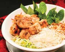 spring rolls with rice vermicelli, cucumbers and lettuce. Garnished with mint leaves, crushed peanuts and served with traditional Vietnamese sauce.