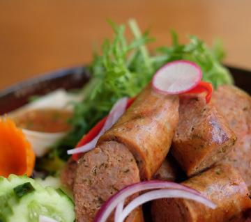THAI SAUSAGES SAI-GROAG Home made spice pork sausages, lightly seasoned and grilled