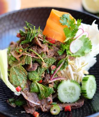 Seafood Minced chicken or pork RAW BEEF SALAD LARB-DIEB Finely chopped RAW beef and tripe tossed with anchovy sauce, lemon juice, kaffir lime