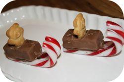 Milky Way Sleighs Ingredients:! Milky Way Bars I used the small ones that come in the multi-packs.! Mini Candy Canes! Tiny Teddies Biscuits! Choc Buds Method: 1.