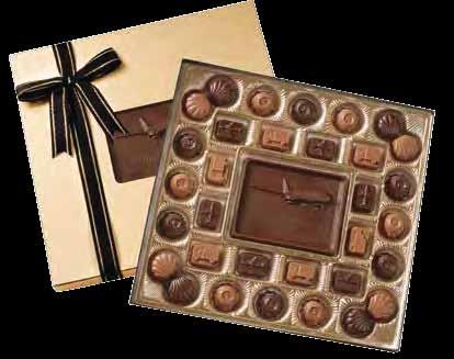 79 Quoted Dimensions: 11 1/4" x 10 3/4" Chocolate Imprint Area: 4" x 3" Packed: 28 per 42 lbs. (19 kg) case Custom Mold Charge: $104.