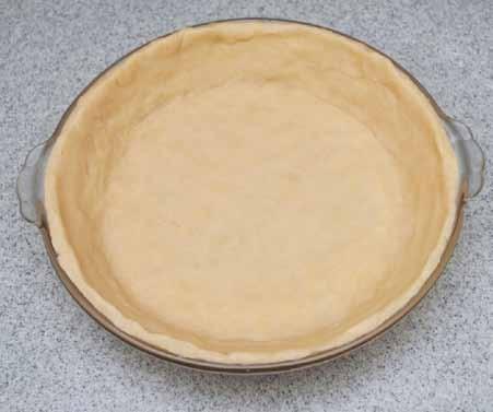 9 6 Carefully place the dough in the pie dish and shape the shell. Make sure there are no bubbles under the bottom of the dough.