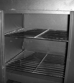 PREPARATION OF SMOKER CABINET 1. Prepare the wood chip and water pans for smoking (See below picture for proper pan placement).