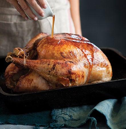MAPLE GLAZED TURKEY 1 10- to 12-pound turkey 1 red apple, peeled 1/3 cup extra-virgin olive oil 2 cloves garlic, crushed and peeled Zest of 1 orange removed in wide strips with a vegetable peeler Sea
