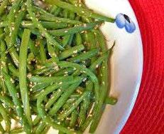 Green Beans with Onions 1 tablespoon extra-virgin olive oil, eyeball it 1 tablespoon butter 1 small onion, chopped 1 cup chicken broth 1 to 1 1/4 pounds trimmed green beans Salt In a medium pan over