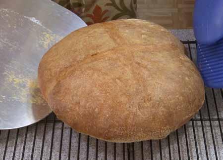 Then reduce the oven temperature to 425 F (218 C) and bake the bread until done, about 30 minutes