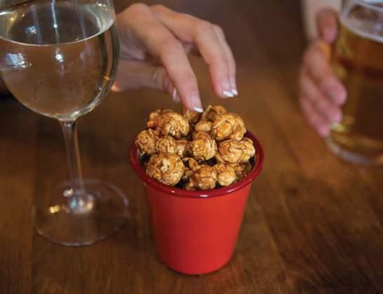 DRINKS. OUR CARAMEL, PEPPER & CHILLI POPCORN IS GREAT WITH A BEER, OR OUR GOATS CHEESE & BLACK PEPPER IS SUPERB WITH A GLASS OF WHITE WINE!