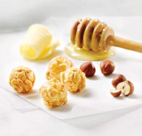 GOURMET POPCORN NUT COLLECTION CARAMEL & ALMOND Enjoy our buttery smooth Caramel to start, followed by the distinctive, nutty Almonds to finish.