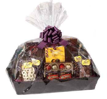 BASKETS Ultimate Gift Basket $154.95 Dazzle them with a bounty of chocolate delights. There s sure to be something for everyone. Item #86625 1 lb. Classic Designer Assortment 14.4 oz.