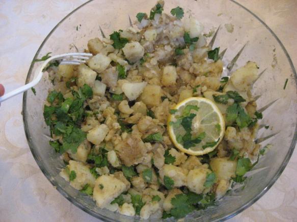 Potato Salad / Aloo chat Ingredients Russet potatoes Cilantro Lemon Cumin and coriander powder Chat masala Directions Boil potatoes until done, but still firm. Cut in cubes.