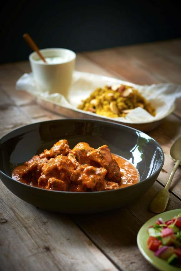 BUTTER CHICKEN 8 chicken thighs (preferably with the skin on), cut into fairly large pieces 2 bottles or cans of diced tomato (350 or 400 g) 1 tbsp fresh ginger, finely grated 6 cloves garlic, minced