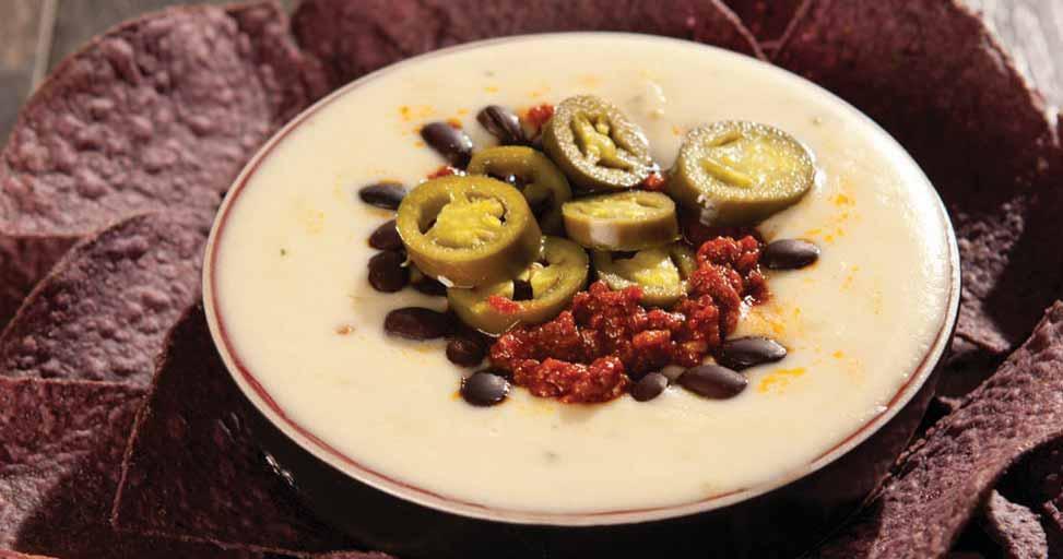 Chorizo Con Queso Dip with Black Beans Creamy cheese dip with chorizo is a perfect