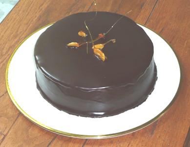 Garnished with dark chocolate curls. Chocolate Cake 3 cake layers.