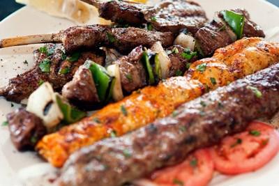 Meat Entrees Shish Kabobs All shish kabobs and meat entrees are served with basmati rice, sautéed vegetables and your choice of Greek salad or lentil soup. Aladdin s Gyro Platter $10.