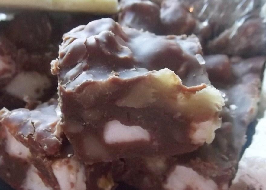 Rocky Road Fudge Ingredients: 1 (12-ounce) package milk chocolate chips, about 2 cups 1 (14-ounce) can sweetened condensed milk 1 teaspoon vanilla extract 3 cups miniature marshmallows 1 1/2 cups