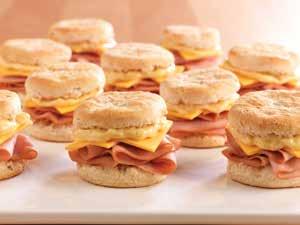Maple, Ham & Cheese Biscuit Yield: 24 servings This sandwich combines sweet and savory in a way students of all ages are sure to love. Margarine 6 tbsp. 3 oz. Pancake Syrup 2 tbsp. 1 oz.