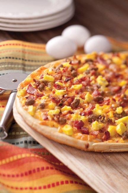 7300 7295 Breakfast Pizza Pizza de Desayuno A crispy crust layered with a rich country gravy with lots of breakfast sausage, ham and egg.