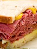 95 NU NWH LUX NY NWH - with french fries + 2.00 N.Y. UBN - pastrami or corned beef with swiss and sauerkraut on grilled rye 7.