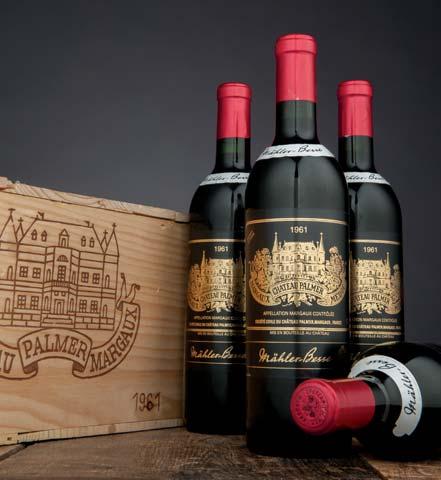 Château Ducru-Beaucaillou 1961 Lot 1259: Two top shoulder, one very high shoulder level; one label slightly damp stained; two late release; one original short capsule reveals fully branded cork; two