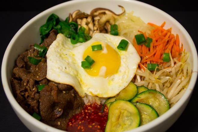 Bibimbap (Korean Dish) Steamed white rice Bulgogi, recipe follows 1 carrot, julienned Cooked bean sprouts, sauteed in a little sesame oil or peanut oil and seasoned with salt Cooked spinach, sauteed