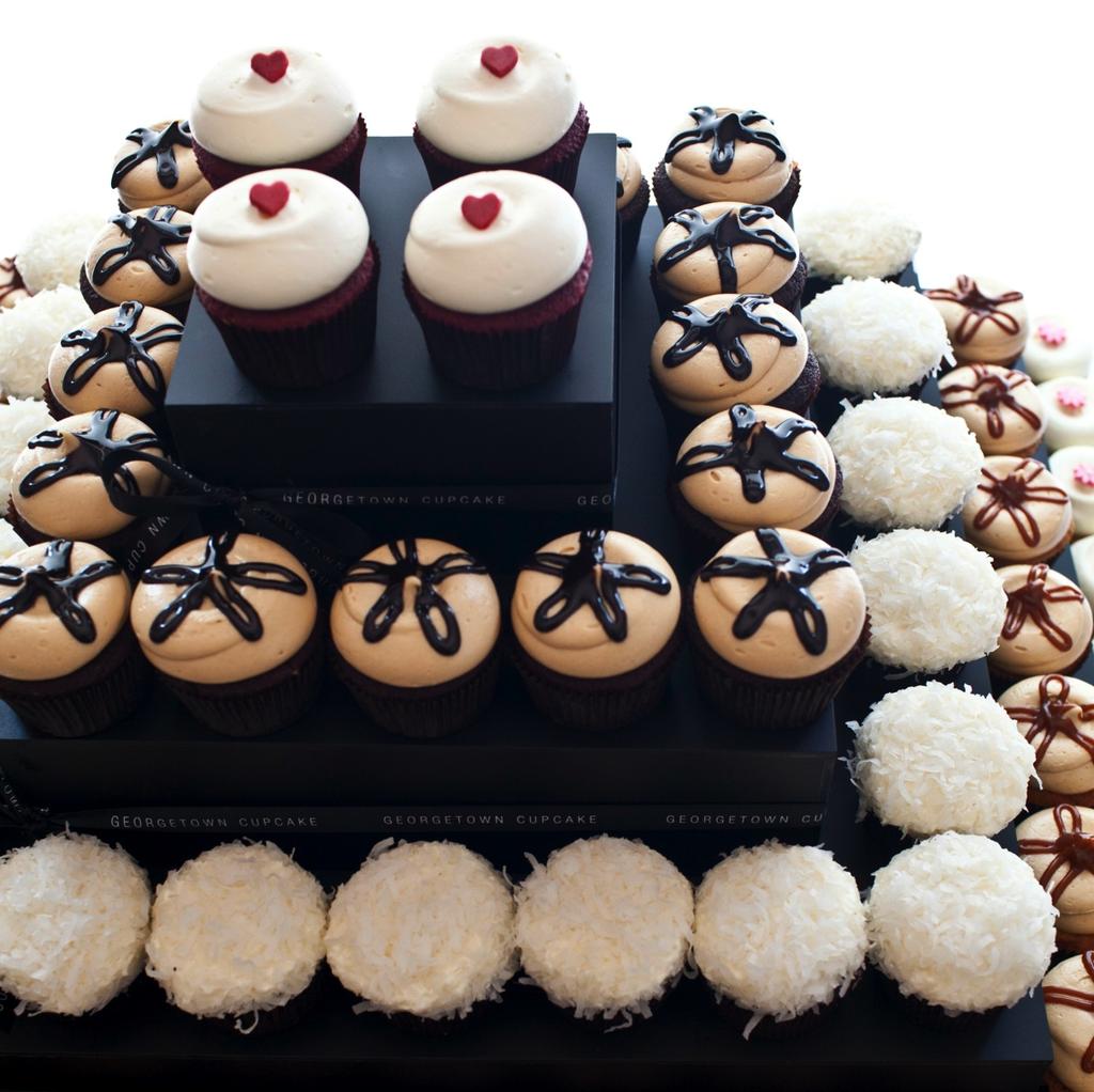 R E C E P T I O N S Georgetown Cupcake creates gorgeous dessert displays for galas, receptions, and other formal affairs.